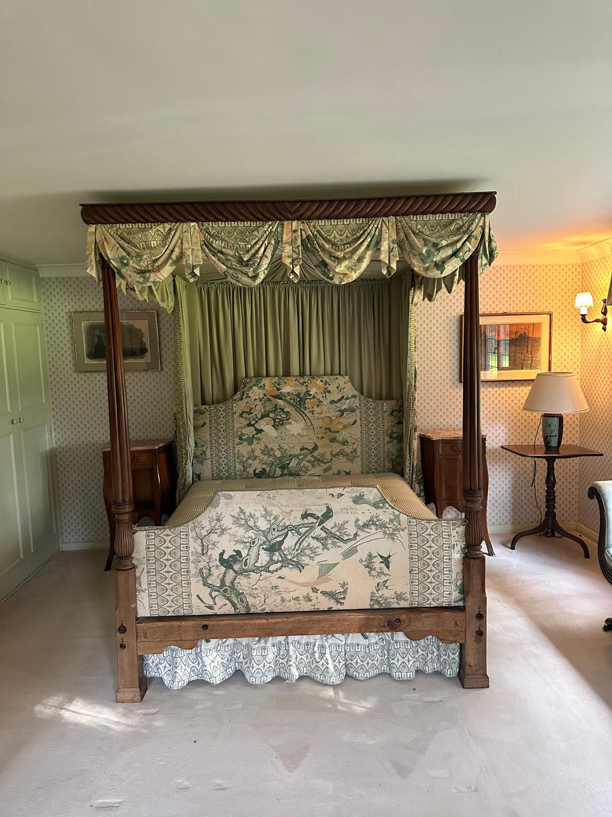 A George III style mahogany four poster bedstead